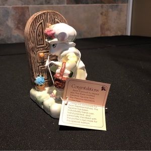 Avon Precious Moments figurine.